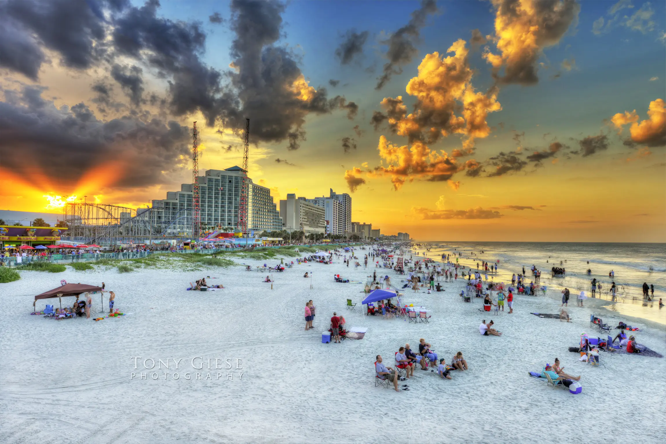 Beach goers enjoy Daytona Beach white sands